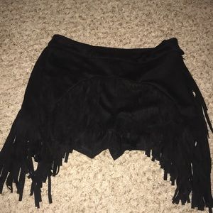 Black suede fringe shorts.